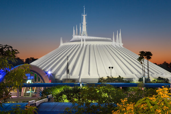Space Mountain and Magic Kingdom at night