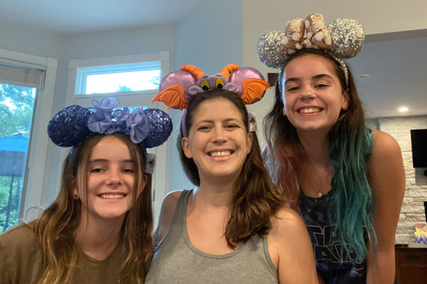 Teenagers with Mickey ears